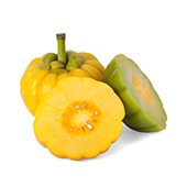 Tre gula Garcinia Cambogia frukter mot en vit bakgrund Tre gula Garcinia Cambogia frukter mot en vit bakgrund
