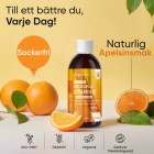 Bilden har en burk av Liposomal Vitamin C och apelsiner runt omkring för att visa att WeightWorlds Liposomal Vitamin C vätska smakar av apelsin